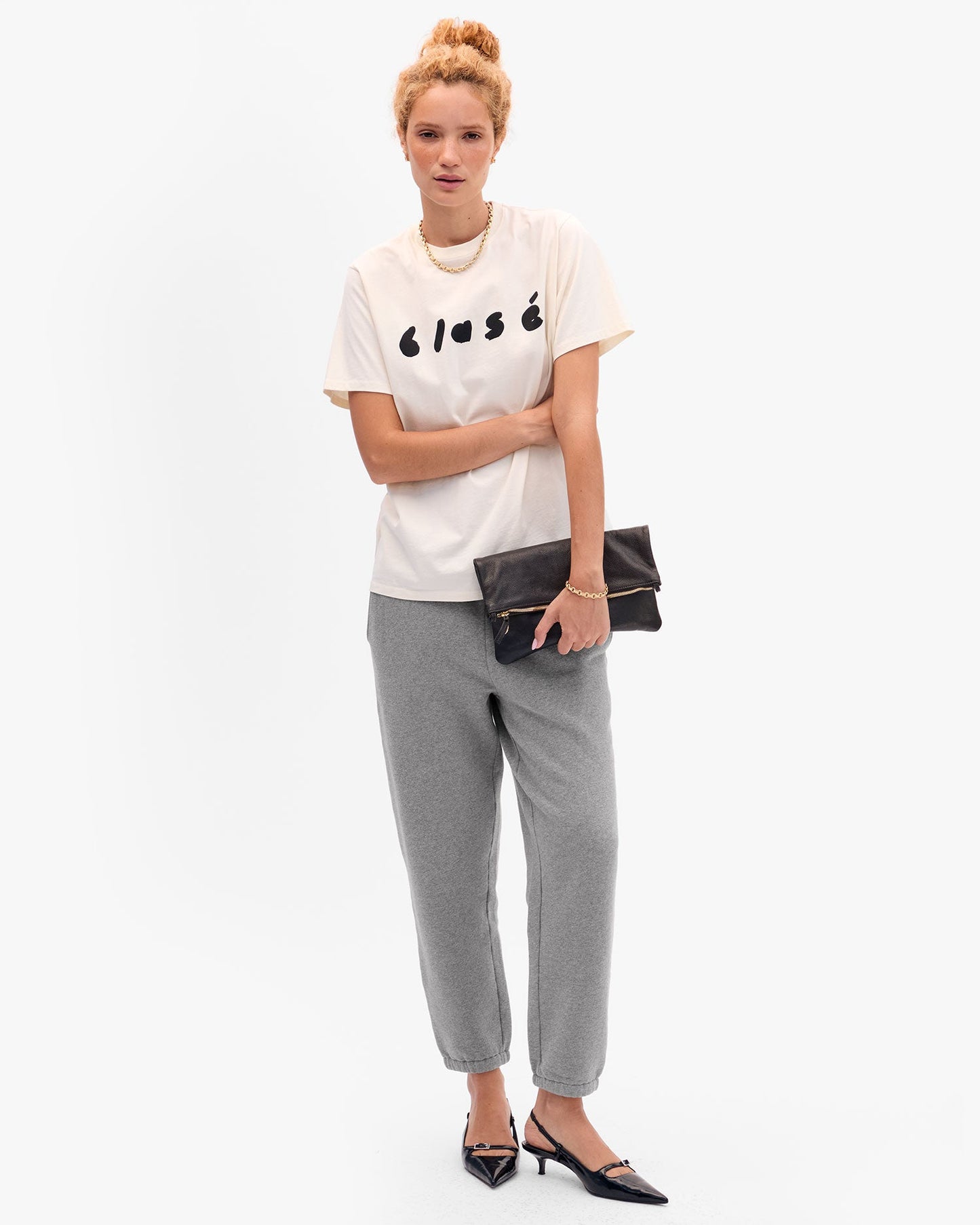 Foldover Clutch w/ Tabs
$295
Black Petit Caviar